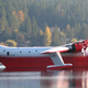 Martin Mars water bomber of Coulson Flying Tankers moored in a lake in Vancouver, Canada (Alex Juorio)